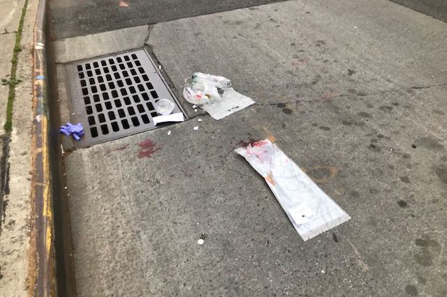 Bloody medical materials left in the street after Saturday's crash.
